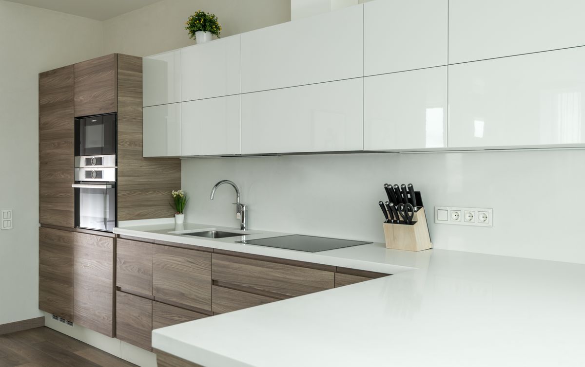 Modern kitchen with built-in appliances integrated into cabinetry