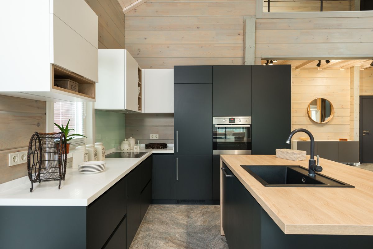 Modern kitchen with soft matte cabinet fronts and built-in appliances