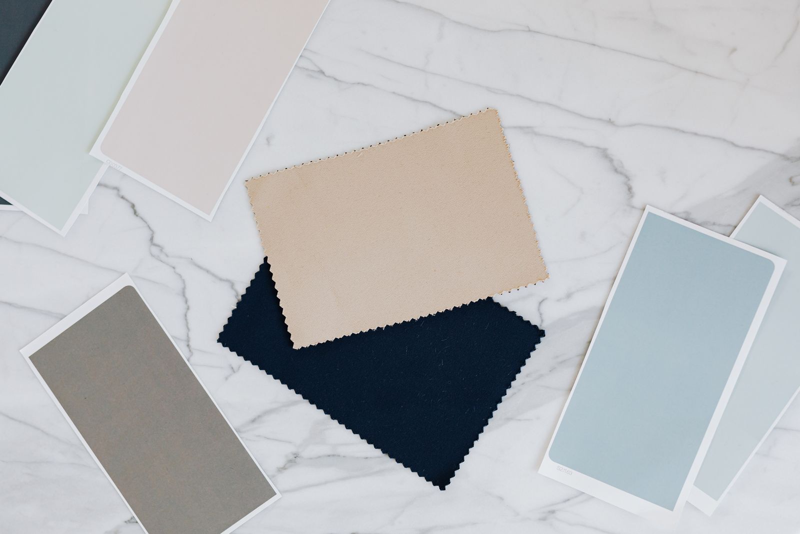 Material samples arranged for custom cabinet finish selection